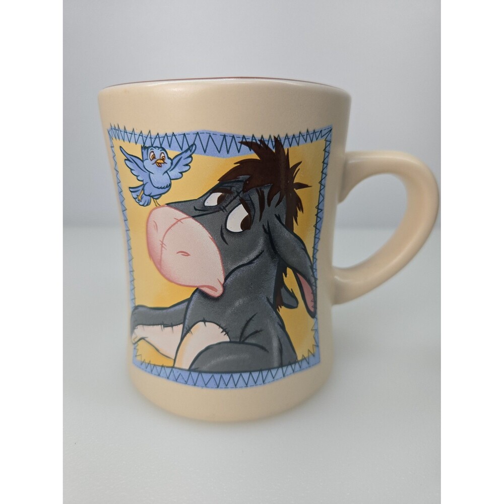 Walt Disney World Winnie The Pooh Eeyore with Blue Bird Coffee Mug Words Inside